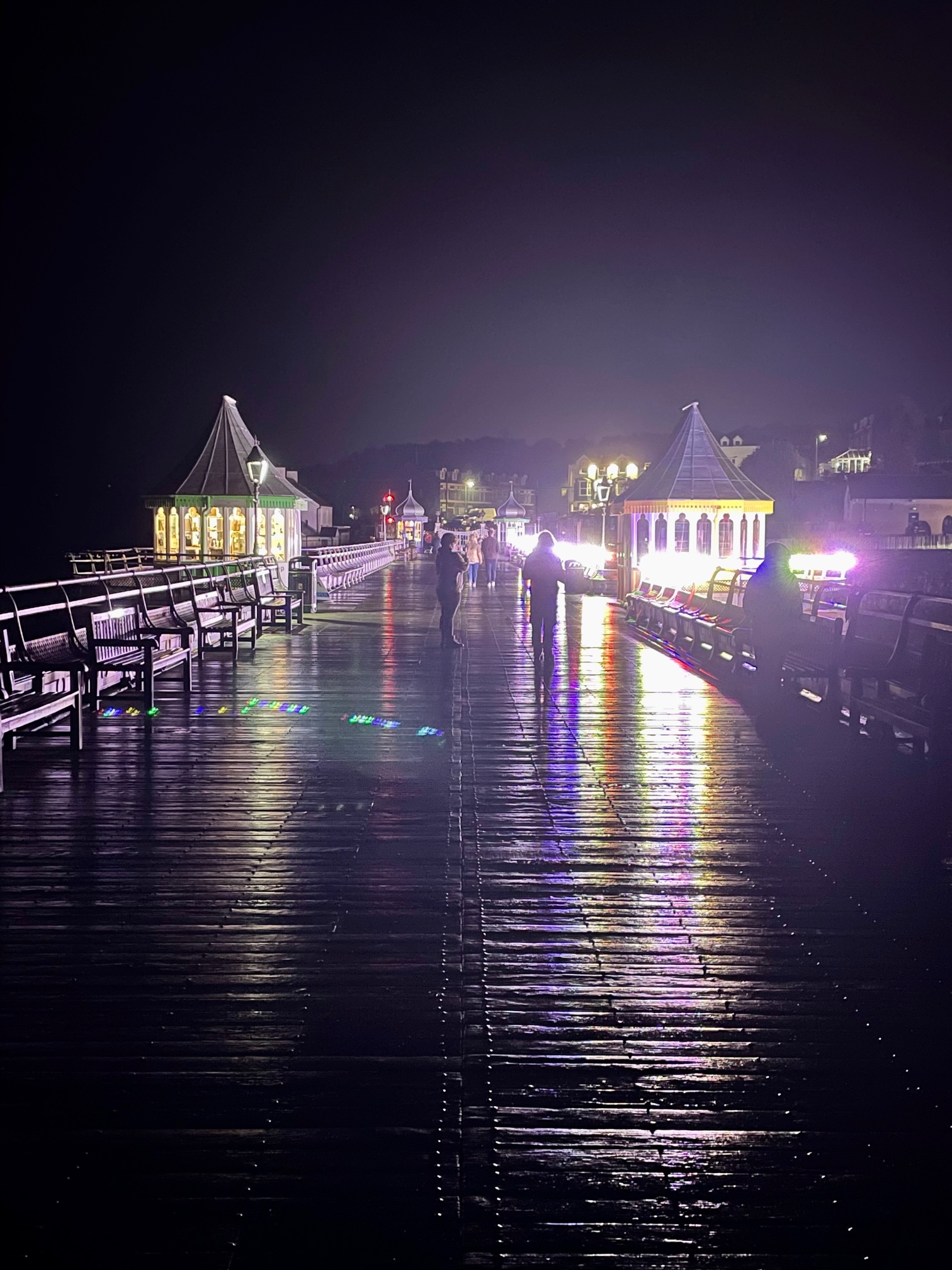Bangor Pier illuminated at night